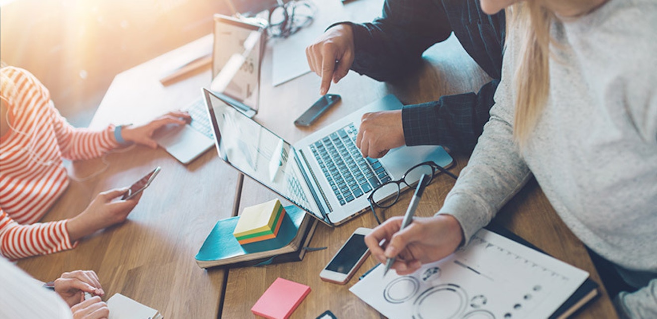 5commonmarketingmistakes postimage group of people working at table