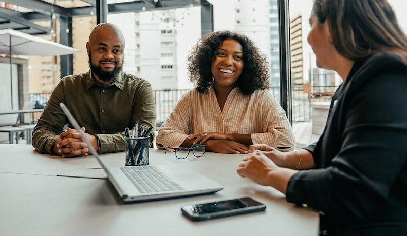 Collaborative Team Meeting in Modern Office | Business Strategy Discussion Diverse professionals collaborate during a business meeting in a modern office, discussing strategy, ideas, and teamwork in a professional setting.