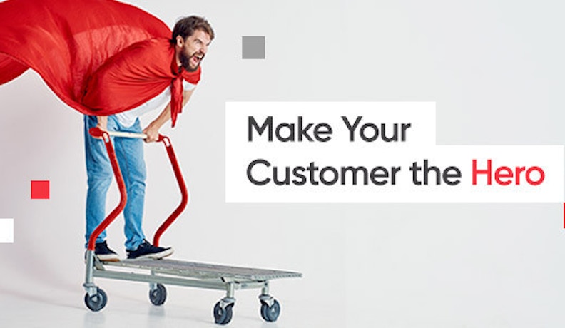 Customer Experience in LBM: Make the Customer the Hero Man wearing red cape on cart symbolizing customer hero role in LBM