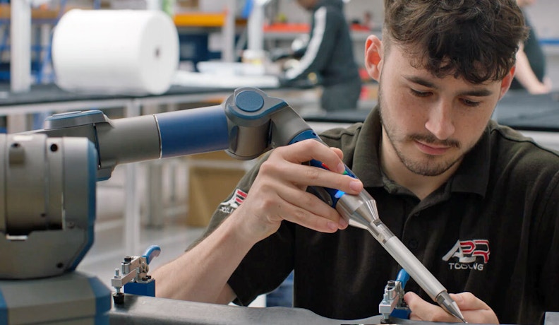A2R Tooling improving manufacturing processes with Ridder iQ Manufacturing technician inspecting components on the shop floor at A2R Tooling