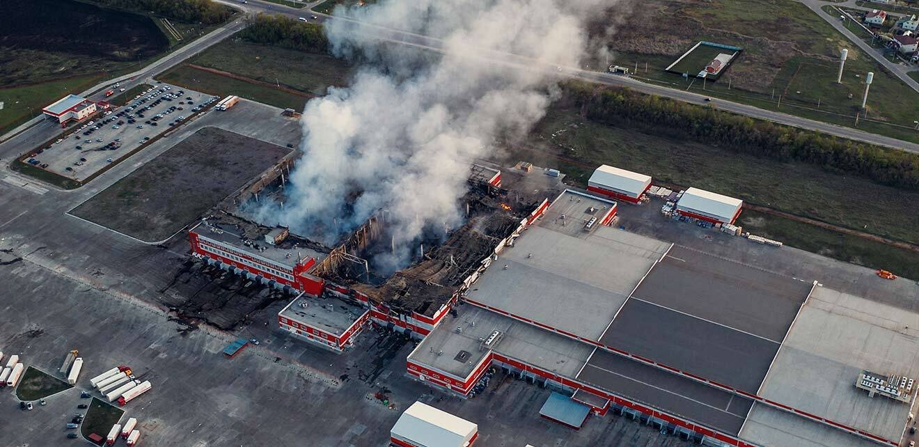 Aerial view of industrial plant on fire.