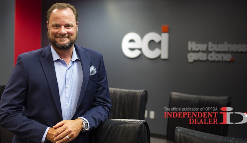 ERP solutions for independent dealers Successful independent dealer smiling.