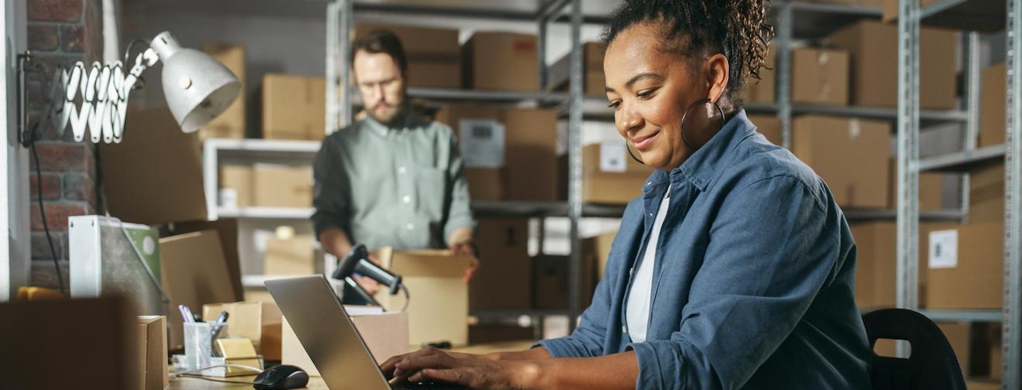 Streamline purchasing with PO Processor Office technician enjoying automated MPS purchasing with PO Processor
