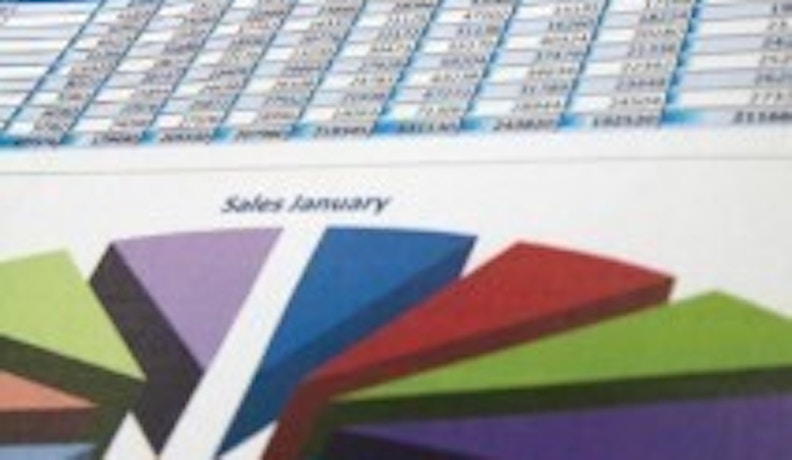 Why Shops Lose Money and How to Fix It Shop floor workers and managers analyzing spreadsheets with reasons for business losses